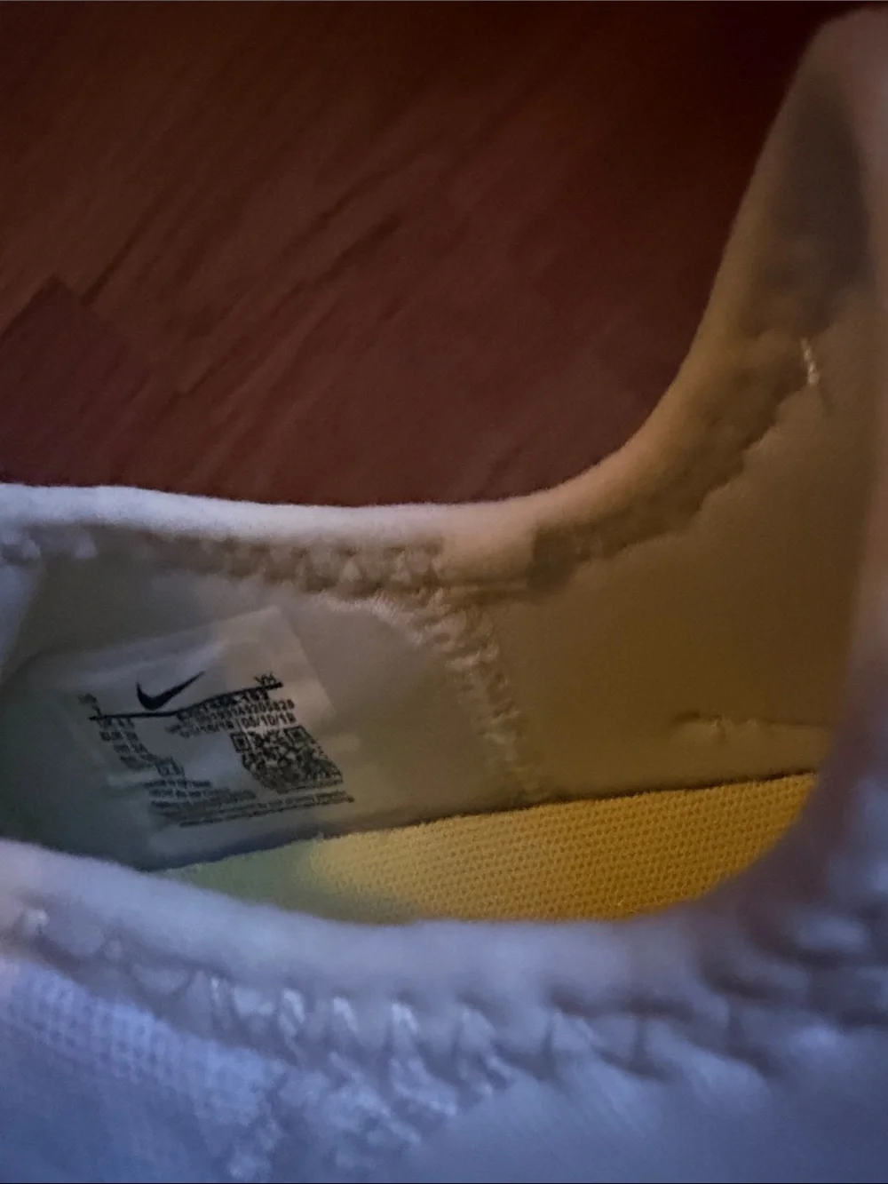 Nike White Athletic Sneakers with Blue Swoosh and Cream Trim
